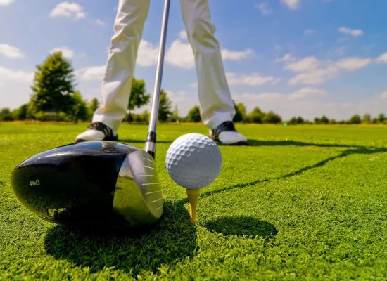 Golfer preparing to tee off