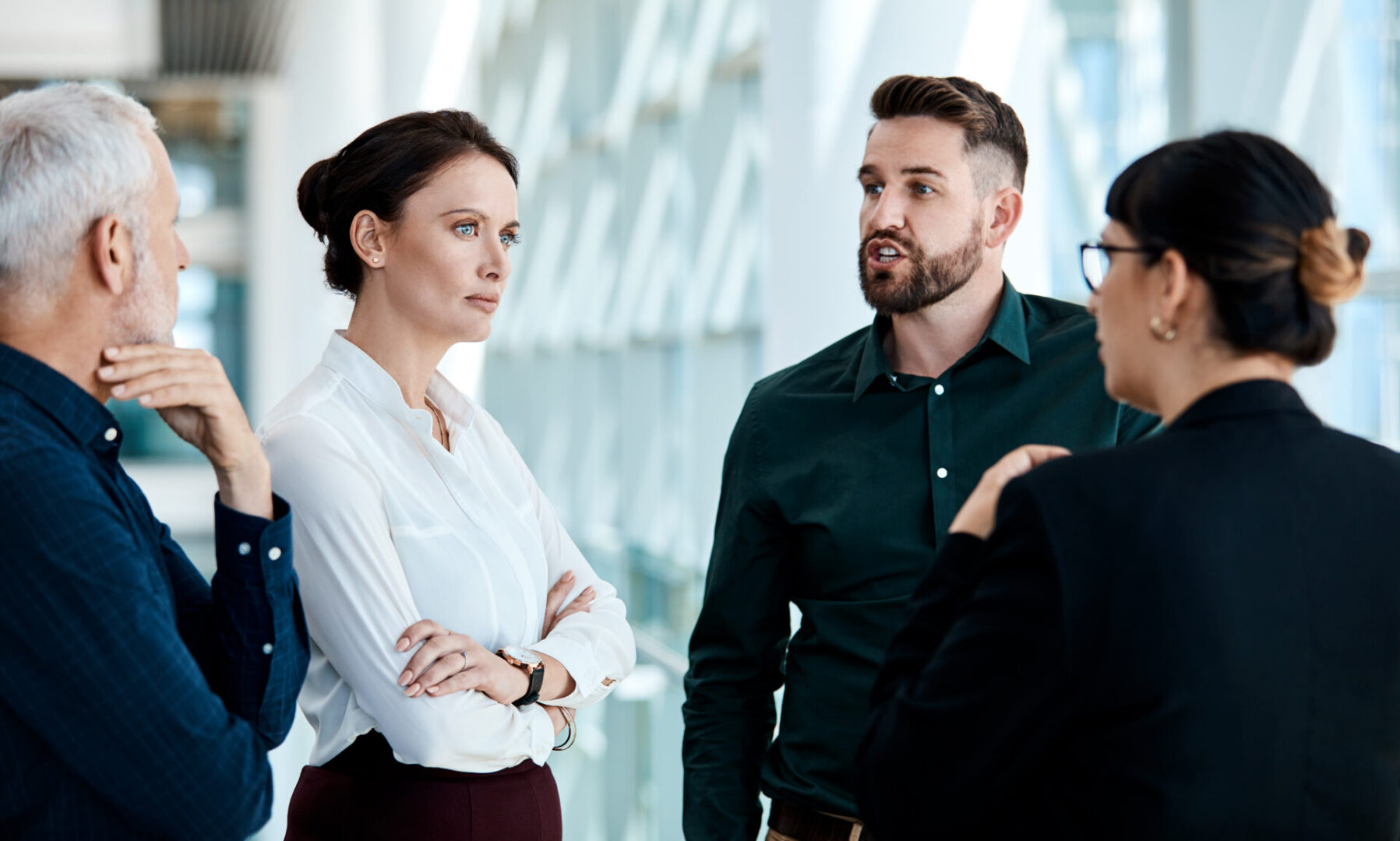 Professionals engaged in serious conversation