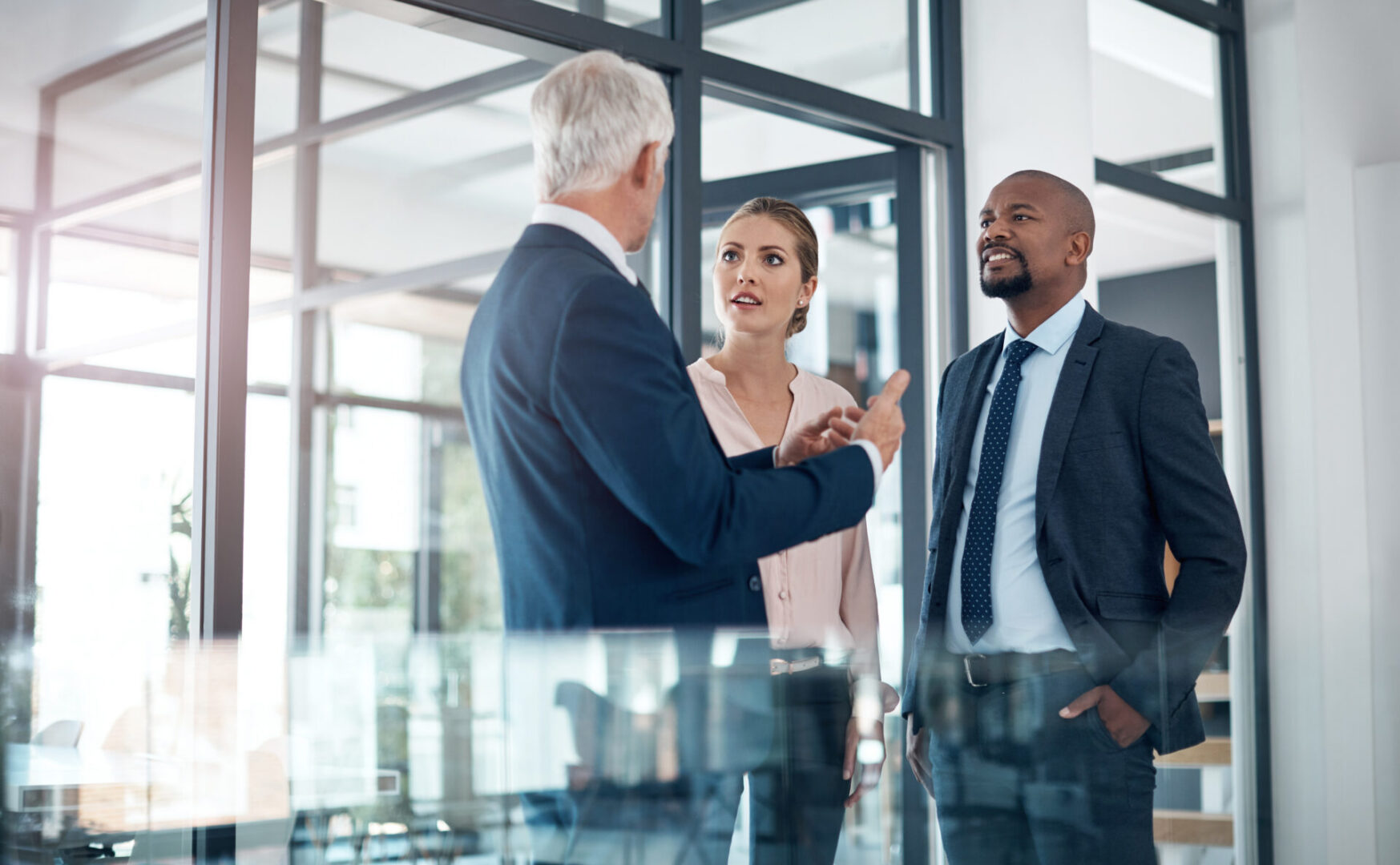 Business meeting discussion in modern office