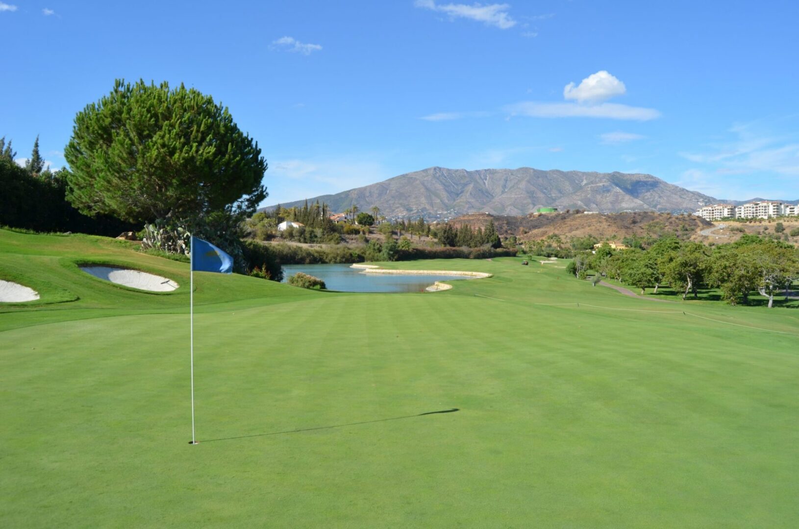Scenic golf course under blue sky
